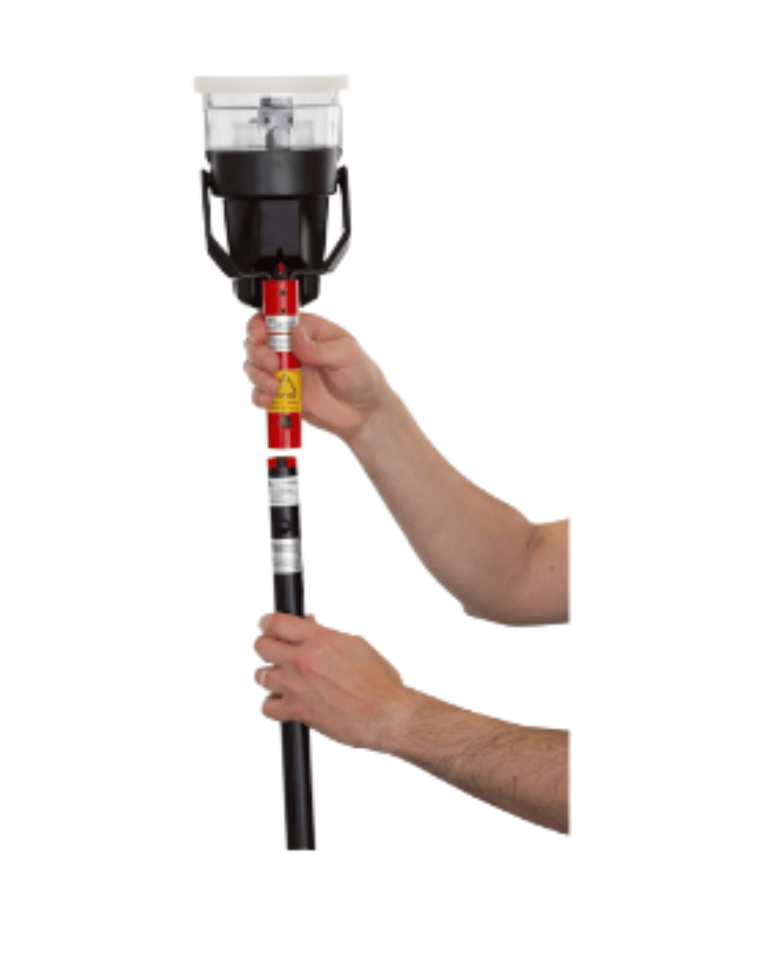 Solo 461 heat detector test kit in use with hands holding extension pole