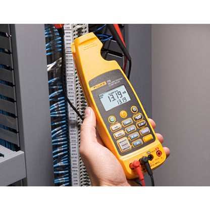 Fluke 773 milliamp clamp meter in hand